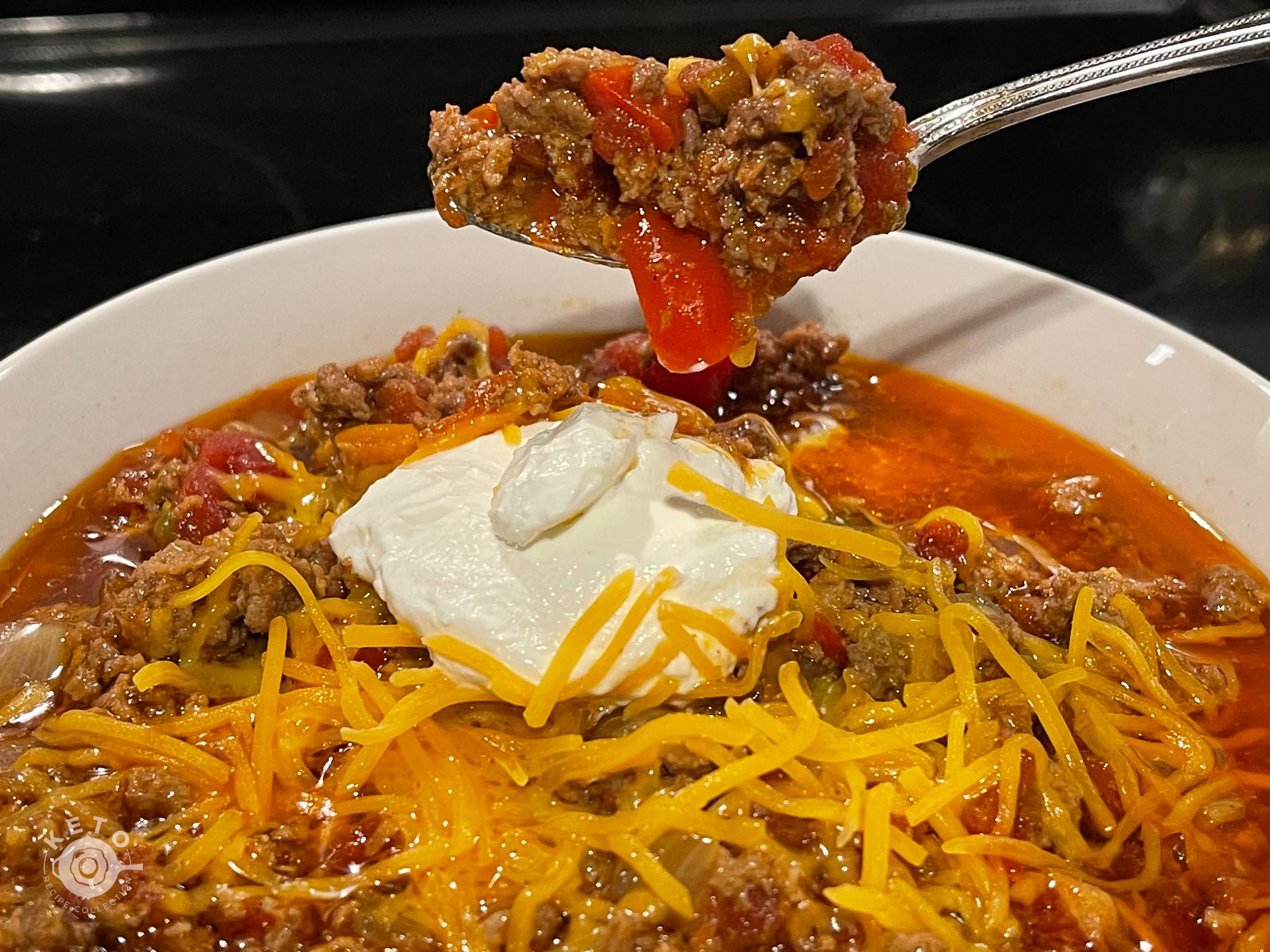 keto taco soup with cheese and sour cream
