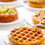white table set with plates of Keto chaffles