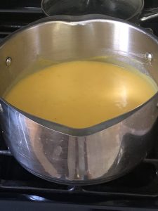silver pot with creamy keto squash/pumpkin soup